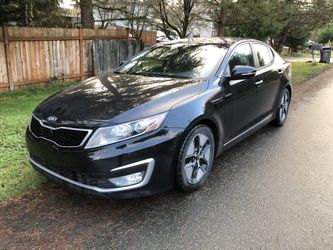 Kia Optoma Hybrid Black, 2013, 61435 miles, Leather/climate Seats,,Kia Optima Hybrid Silver, 2012, 39,702 miles, fabric seats. Good car.