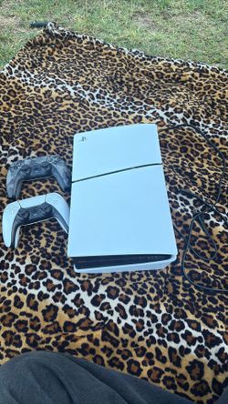 playstation 5 with two controllers