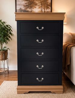 Black dresser with brown ends