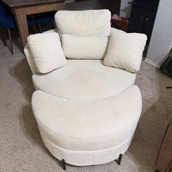 Swivel cream cozy chair with ottoman