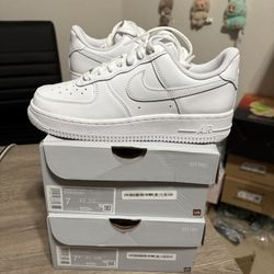 Size 7 or 7.5 women’s - Nike Air Force 1 Low Triple white