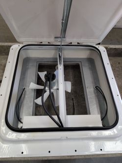 RV roof vent with fan and light