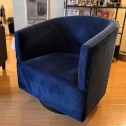 Rotating Blue Suede Chair