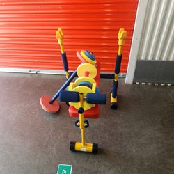 Bench Press kids w/ Olympic Bar 2 dumbells