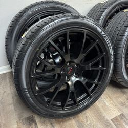 NEW 22x9.5 Matt black srt wheels wrapped in Lexani 305/35r22 tires