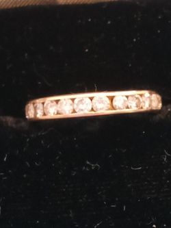 14 K Gold Band With Diamonds All Around  3 Grams