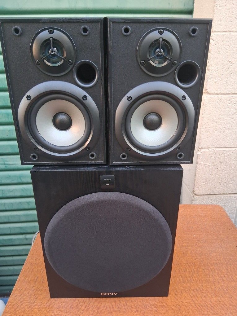 Sony Subwoofer With 2 Sony Shelve Speakers.