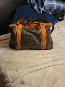 MK PURSE USED ONCE IN PERFECT CONDITION 