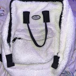 white fuzzy backpack/ purse