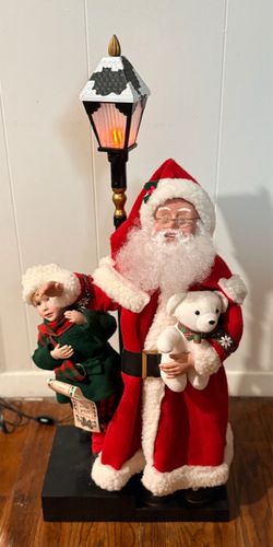 Vintage animated Santa reading naughty list