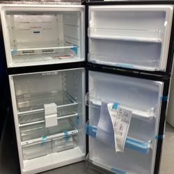 Frigidaire Top-Freezer Refrigerator in Bright LED Lighting with Humidity-Controlled Crispers and Black