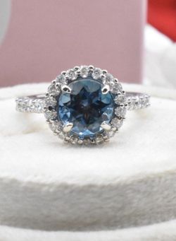 Custom made London blue topaz/diamond ring (OBO)