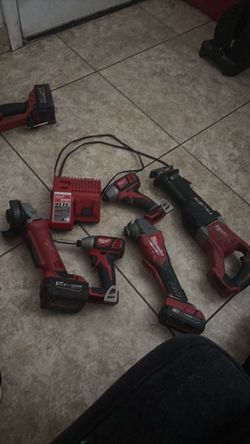 Milwaukee tools 2 impact 2 grinder 1 is fuel 1 saw sally