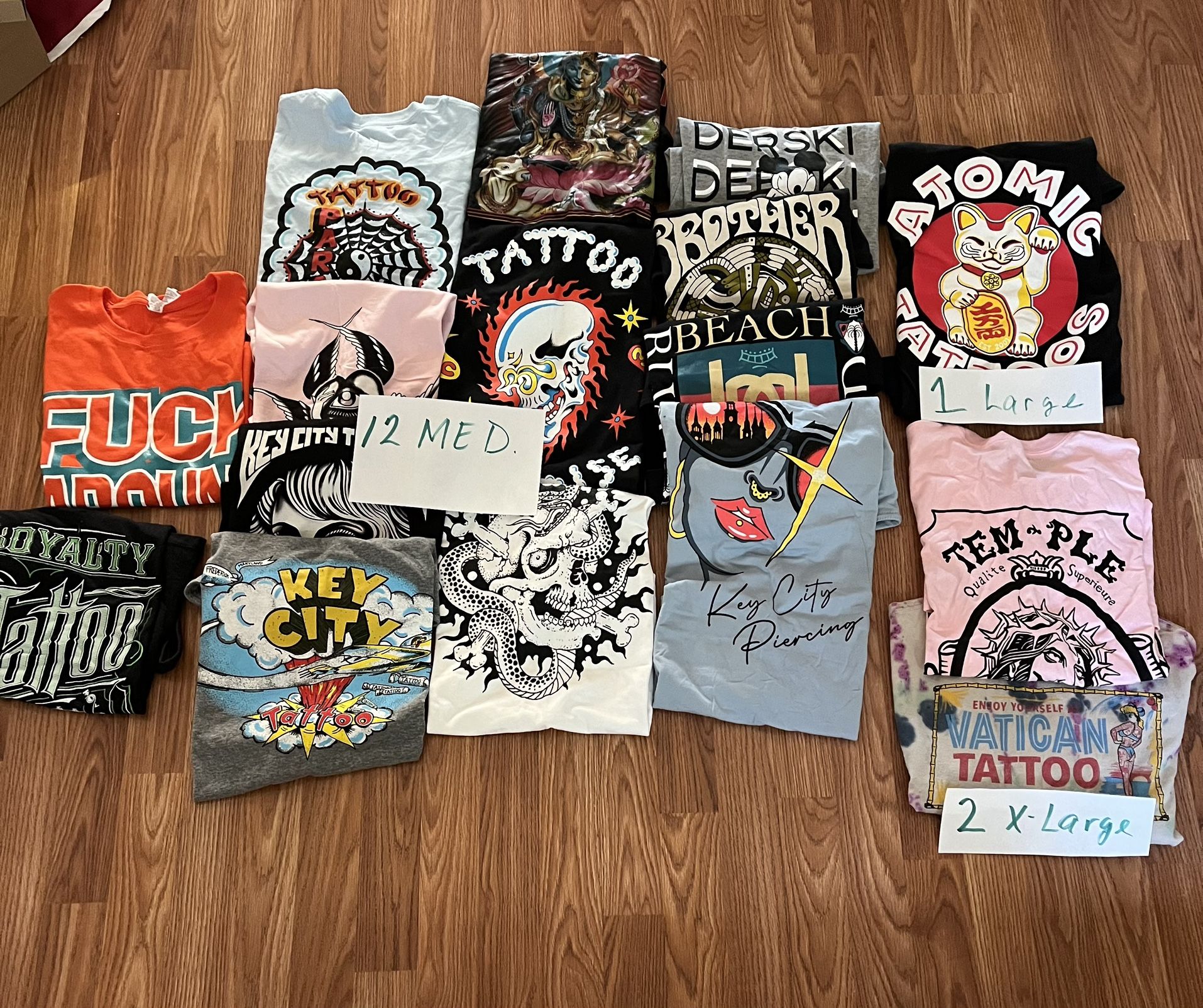Tattoo Motif T Shirts. 12 Are Size Medium. 2 Are X-Large. 1 Is Large Most Never Worn.