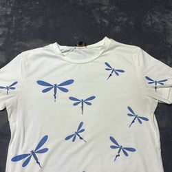 White shirt with blue dragonflies (they have rhinestones)