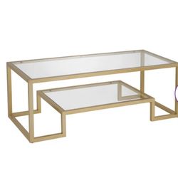 Glass coffee table w/ gold trim