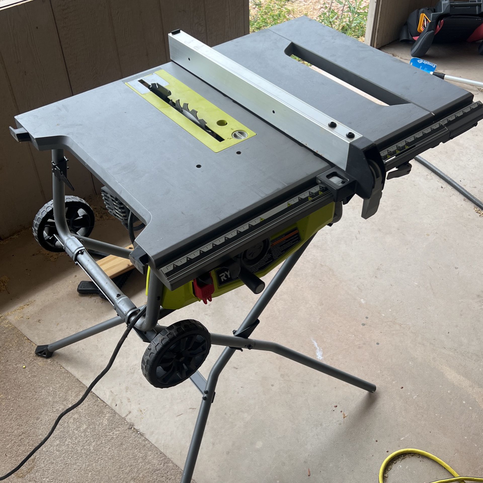 Ryobi 15 Amp Table Saw With Foldable Stand And Wheels 