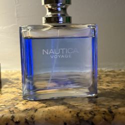 3.4 fl oz bottle of Nautica Voyage Eau De Toilette Spray for Men. 