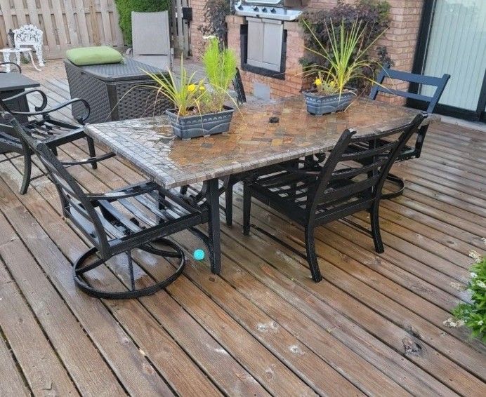 Very Large Rectangle Solid Stone Patio Table With 4 Aluminum Chairs