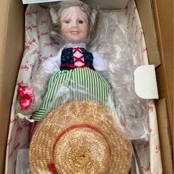 Shirley Temple "Captain January" porcelain doll by The Danbury Mint, still in its original packaging