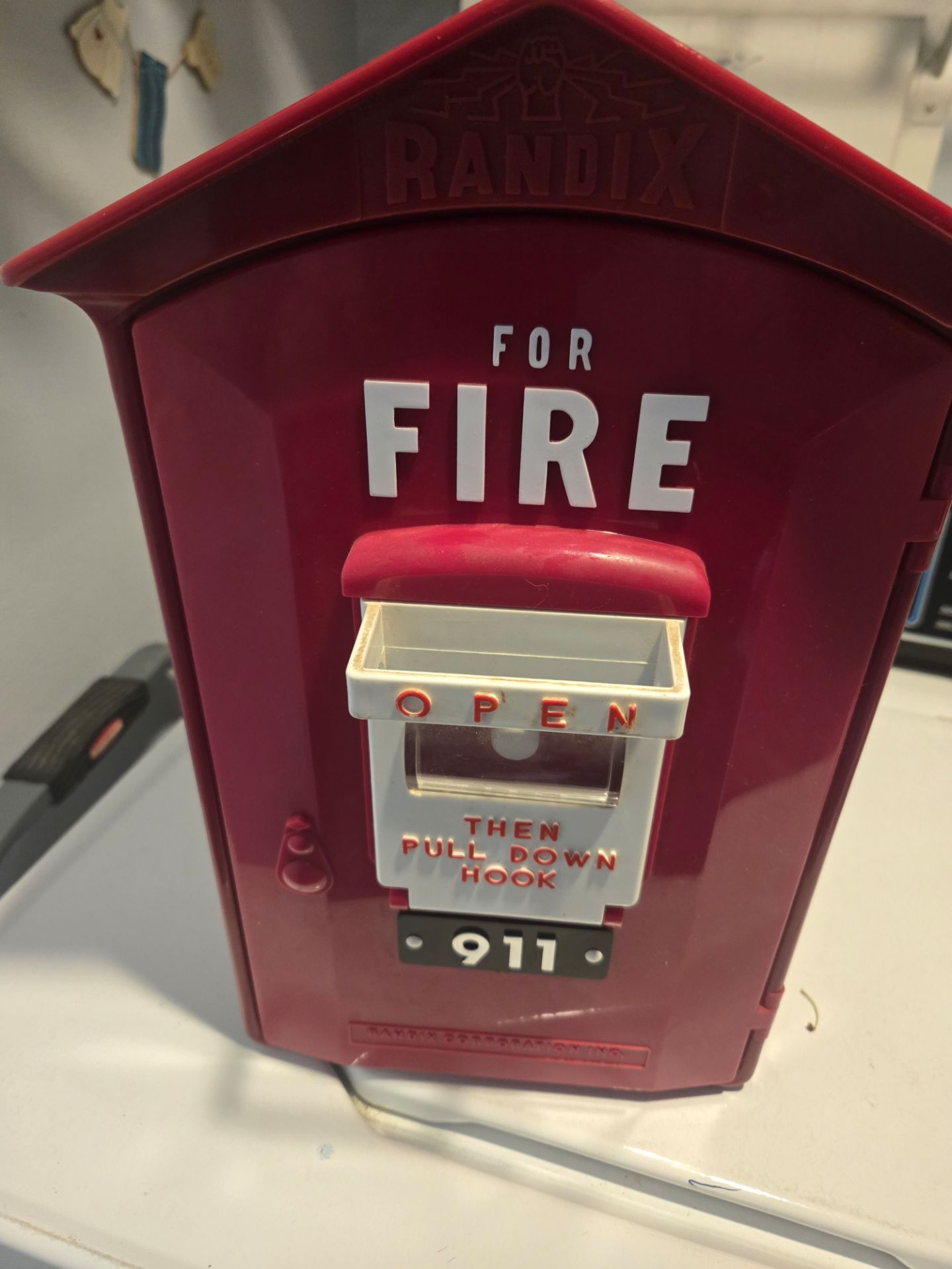 Novelty fire alarm landline phone