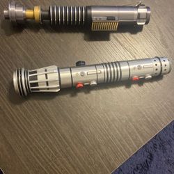 Luke Skywalker and Darth Maul authentic replica light sabers