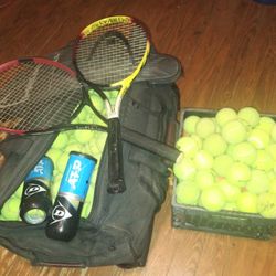 Tennis Balls and Two Rackets