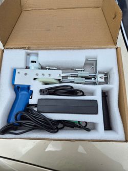 Tufting gun