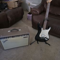 Fender Stratocaster Electric Guitar + Amp