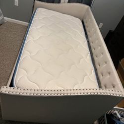 Twin size bed with mattress