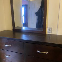 Double Sided Wood Dresser With Huge Mirror Attached. 