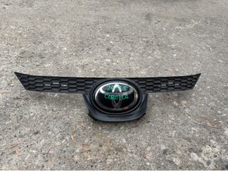 2020-2025 TOYOTA COROLLA UPPER GRILLE OEM