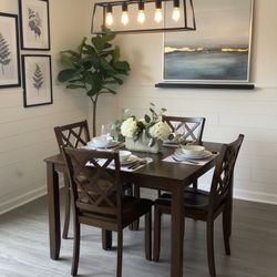 🍽️ Moving Sale: Modern Dark Wood Dining Set - Table and 4 Chairs! 🛋️