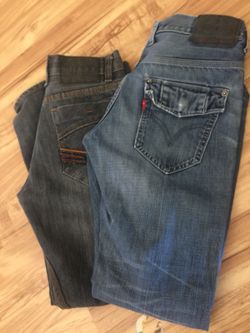 Two pairs of men’s pants size 30/30 small hole in the Levi’s