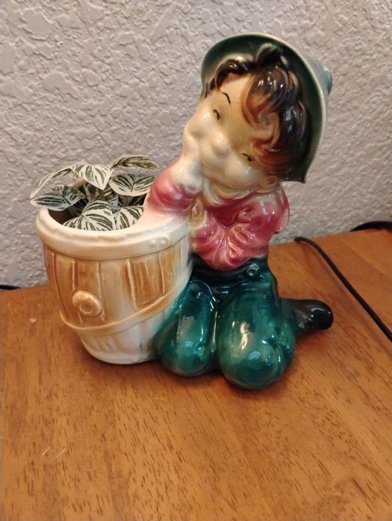 Vintage Little Boy Dreaming By The Flower Pot