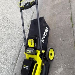 Lawnmower ryobi push come w 6ah battery & fast charger new 