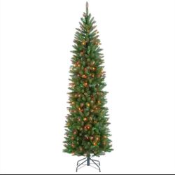 New 6.5 ft. Artificial Christmas Tree with Multicolor Lights. New in the box.