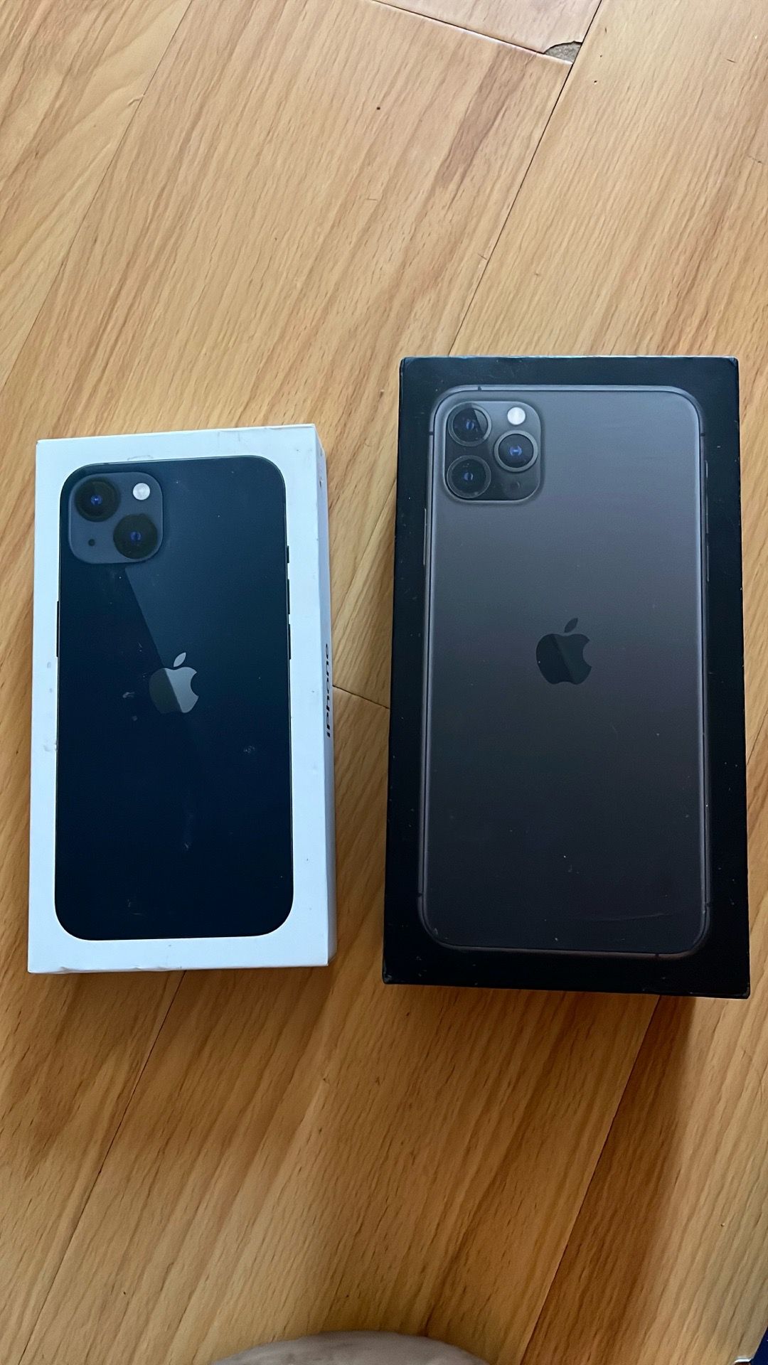 iPhone 13 and iPhone 8 Pro Max empty boxes