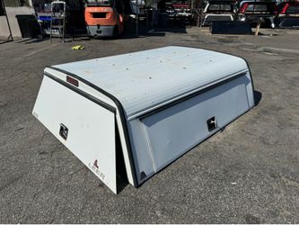 Nissan frontier camper Shell. Commercial work top