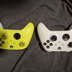 Two Xbox Controllers 