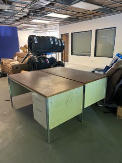 Two metal office tables