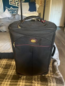 Great deal great condition 22” length black suitcase 🧳 luggage on wheels 🛞