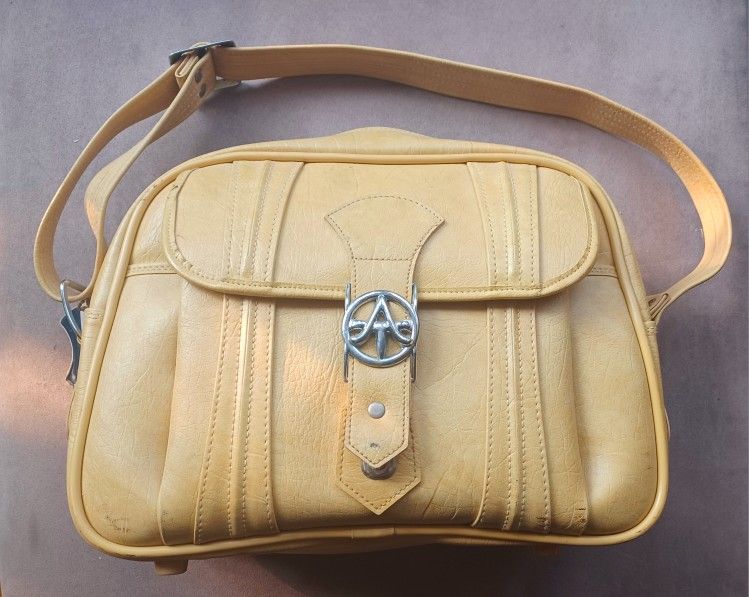Vintage 70's ladies American Tourister Carry On Tote Overnight Bag Luggage...yellow.
