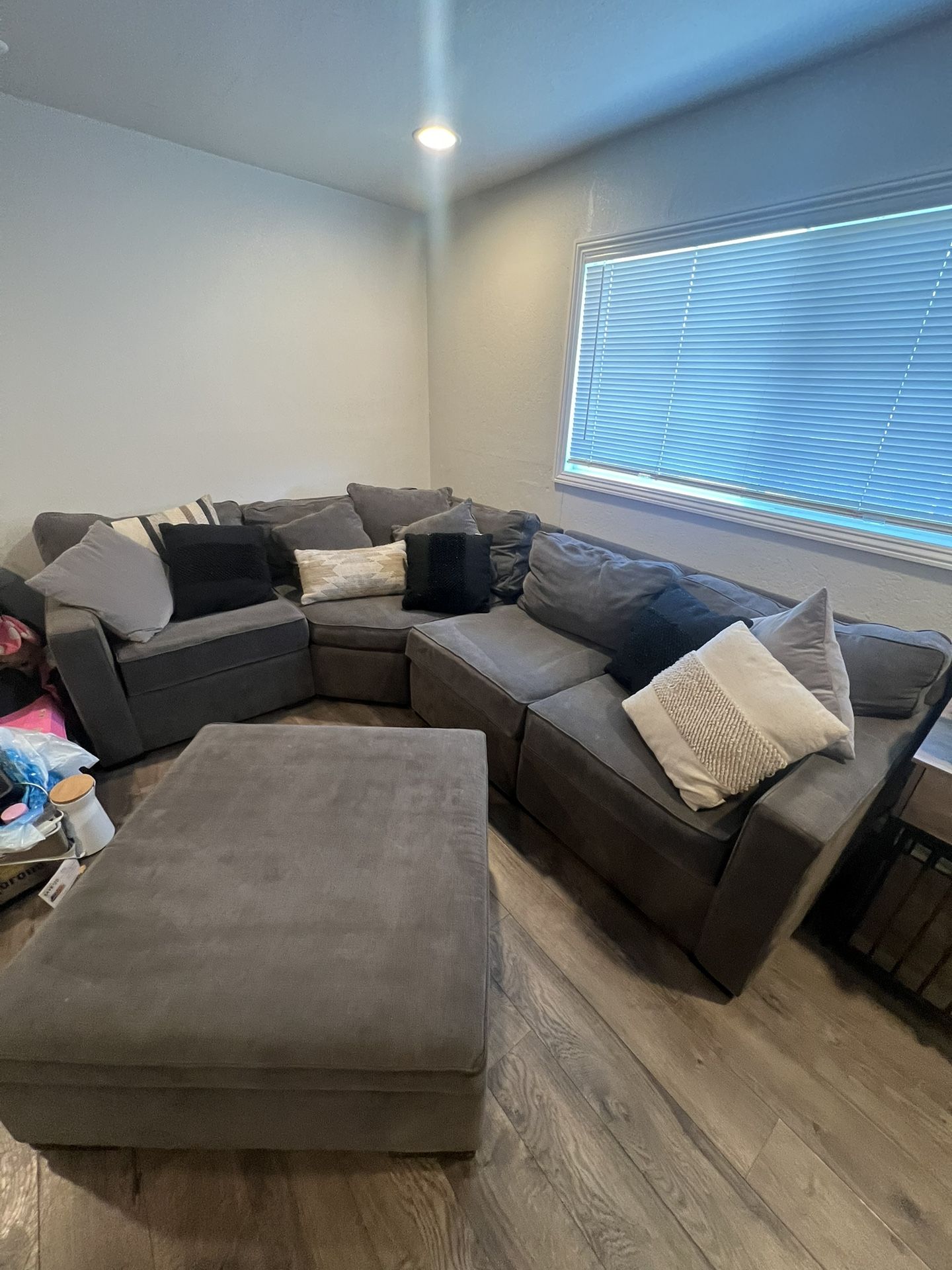 Grey Sectional With Ottoman