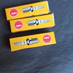 Plugs. NGK. THREE