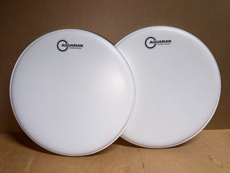 (2) Aquarian texture coated drumheads 14”