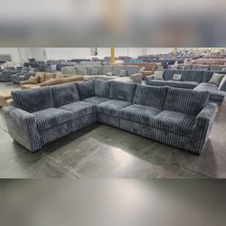 Dark gray jumbo corduroy sectional couch 