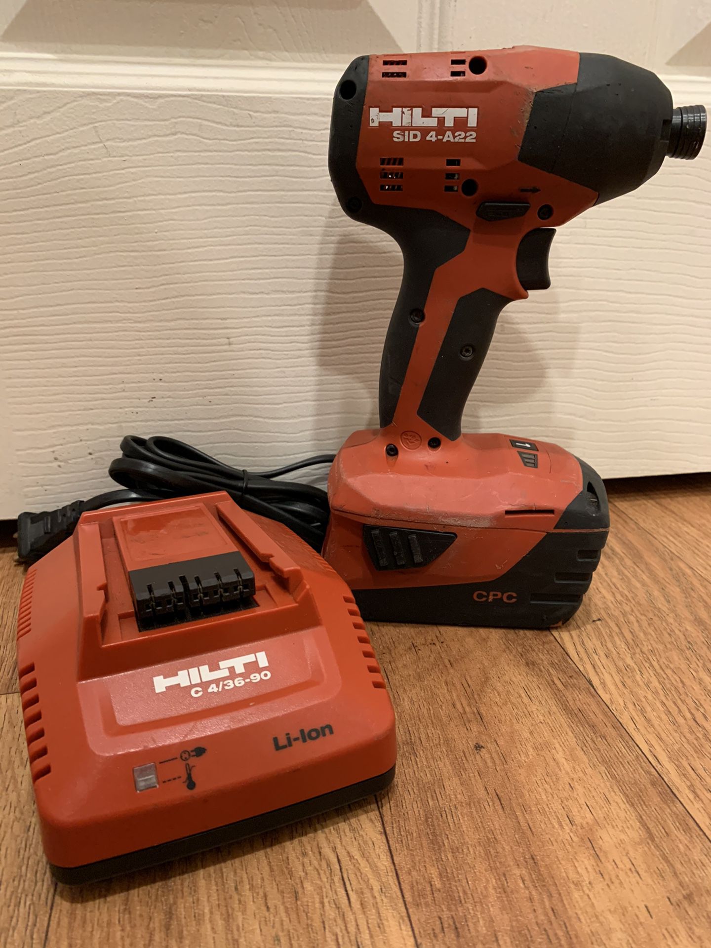 Hilti 22 volts impact driver with battery and charger. Excellent working condition. $130 price is firm