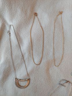 Box full of jewelry—lots of pieces.