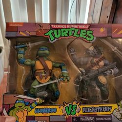 TEEN AGE MUTANT NINJA TURTLES LEONARDO VS ROCKSTEADY